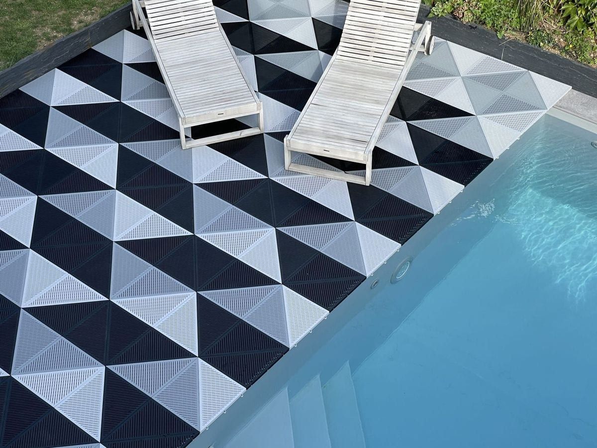 Keep on Flooring modular flooring installed on exterior deck by the pool